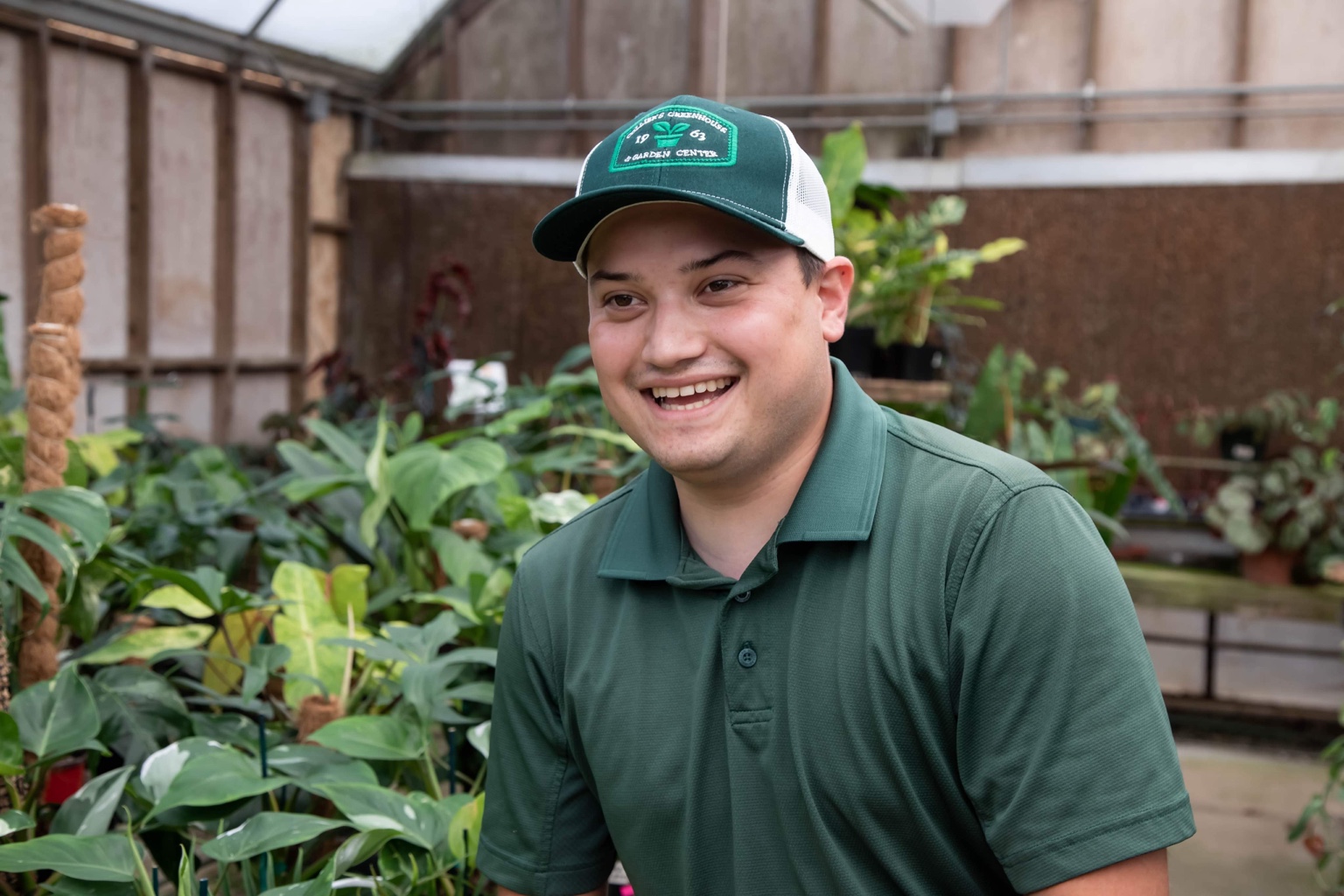 Samuel Di Rito in a greenhouse
